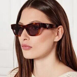 NEW PRADA GOLD SUNGLASSES